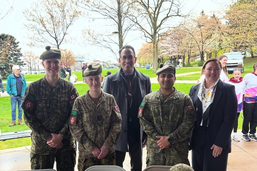 Louis Frapporti at a community event with members of the Canadian Armed Forces