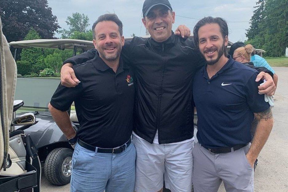 Louis Frapporti with participants at a community sport event