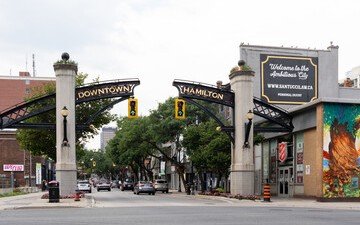 The Downtown Hamilton gateway arches on a city street