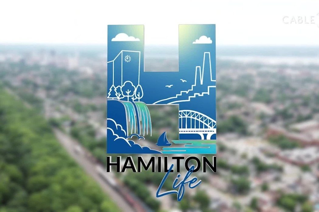 Hamilton Life programme title over an aerial view of the city